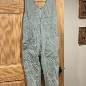 We The Free Striped V‑Neck Utility Jumpsuit in Light Blue and White